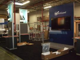 Custom Island Exhibit with Backlit Silicone Edge Graphics and Presentation Stage -- Image 1