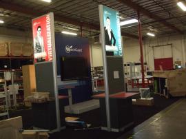 Custom Island Exhibit with Backlit Silicone Edge Graphics and Presentation Stage -- Image 2