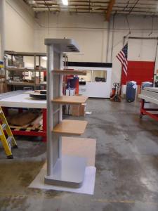 MOD-1253 Two-sided Kiosk with Base, Shelves, and Puck Lights -- Image 2