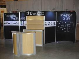 Customized ECO-2003 RENTAL with Fabric Graphics, LED Lights, Curved Header, Added Shelves, and ECO-3C Podium -- Image 2