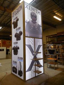 20 x 20 Island Featuring an LED Backlit Tower with (4) Custom Accent Lighting Product Kiosks -- Image 1