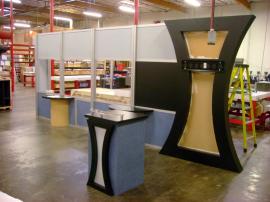 10' x 20' Visionary Designs Display with Custom Counter and Backwall