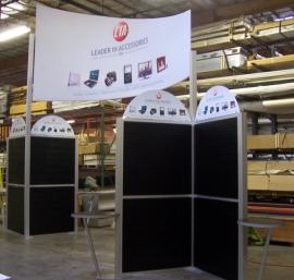 20' x 20' Island Exhibit Rental with Slatwall and Tension Fabric Header